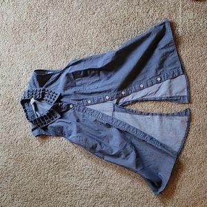 Blue sleeveless top with black studded collar